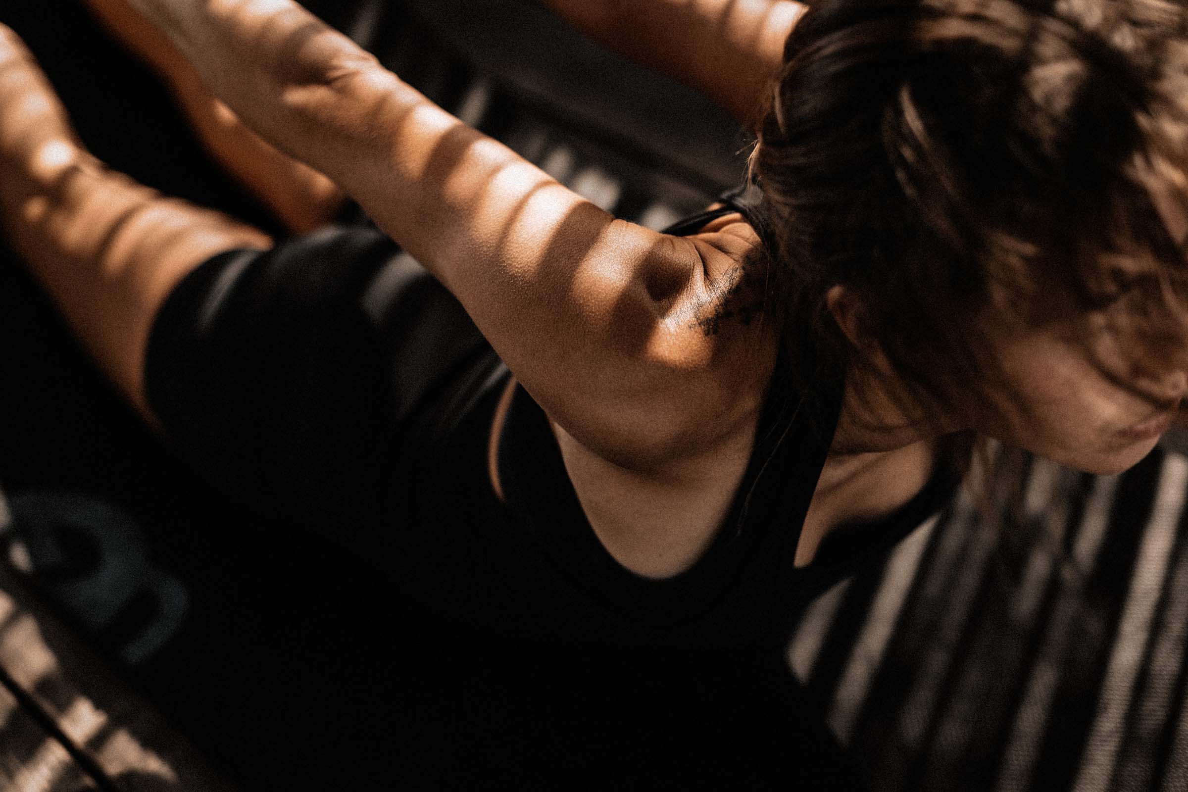 Experienced yoga student practising a strong arm balance